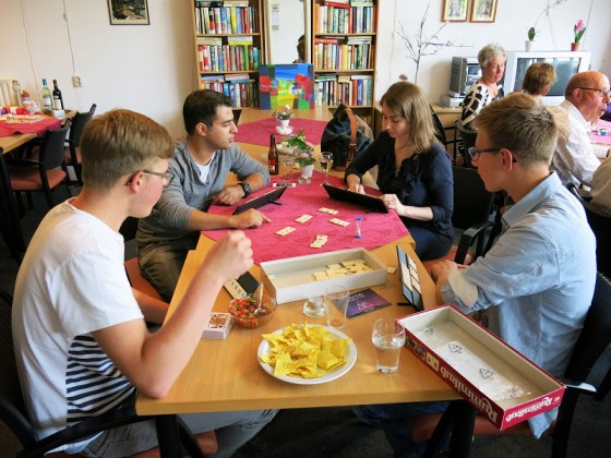 Dominating at Rummikub! The boys don't stand a chance!