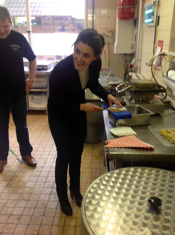 Hannah cutting her waffle in half!