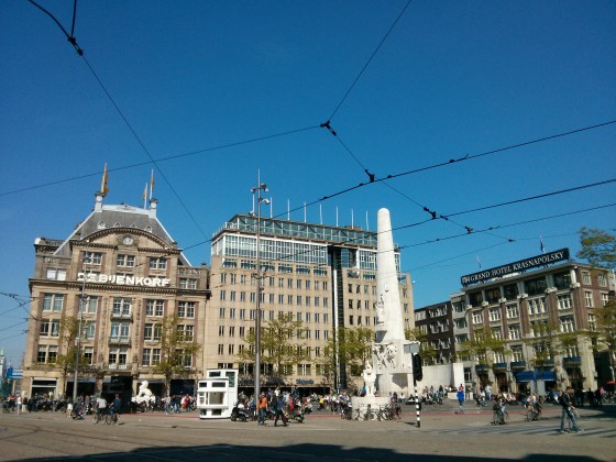 Dam Square, with the National Monument and De Bijenkorf (luxury department store) in view