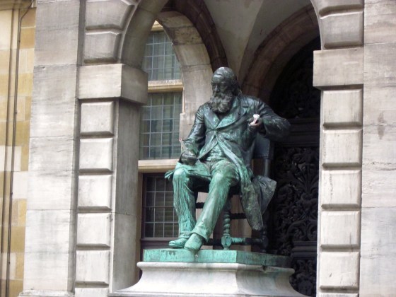 Closeup of the beer in Hendrik Conscience's hand