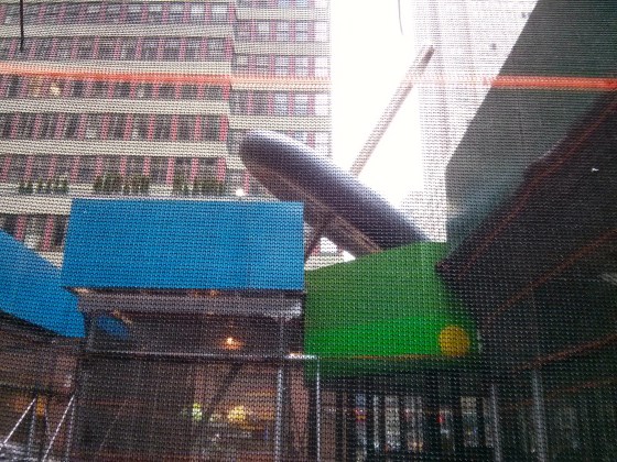 Sculpture of "Needle threading a button" being worked on