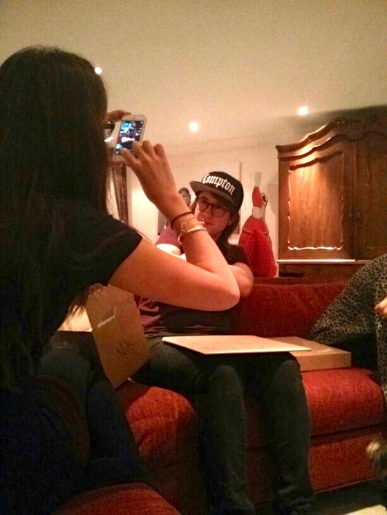 Nikki posing with her new Compton baseball cap