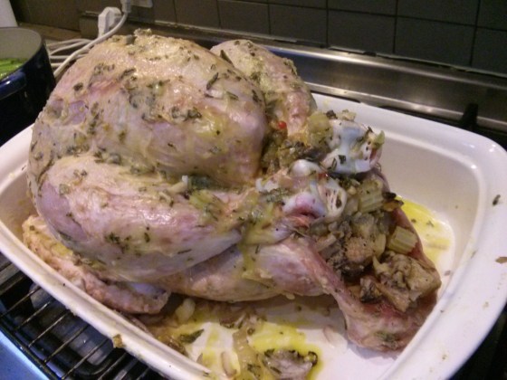 Koen's turkey before going into the oven - filled with Martha Stewart's mushroom and walnut stuffing. http://www.marthastewart.com/331736/mushroom-and-walnut-stuffing http://www.marthastewart.com/331734/roast-turkey-with-rosemary-and-lemon