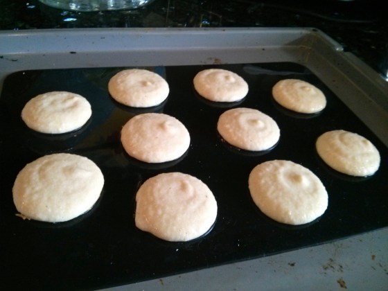 Macarons going into the oven