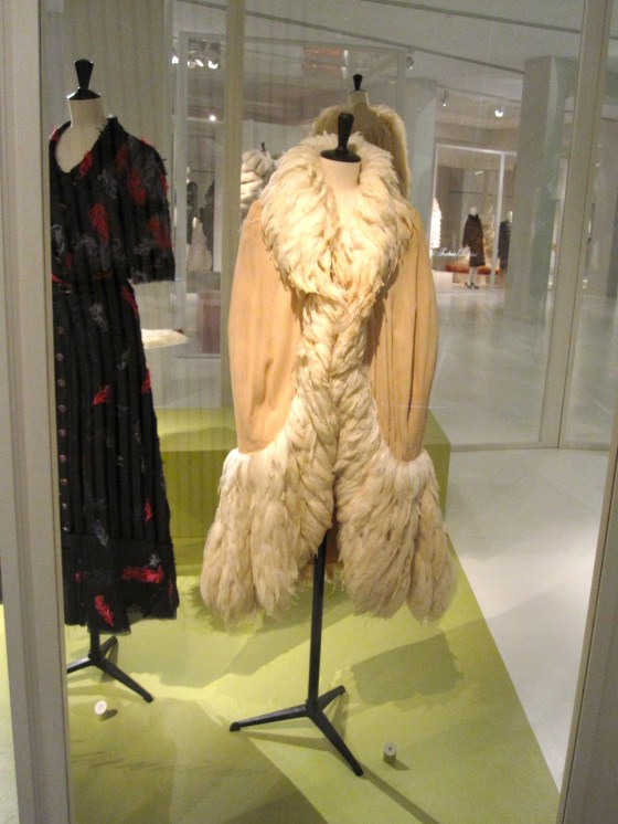 Chanel, Haute Couture Spring-Summer 1925; Cape in silk crepe, decorated with very fine pleats, trimmed with rooster feathers