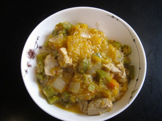 Quimbombó con Carne de Puerco y Bolitas de Plátano - not the prettiest dish, but delicious! You can see the the plantain dumplings are smushed and not round anymore