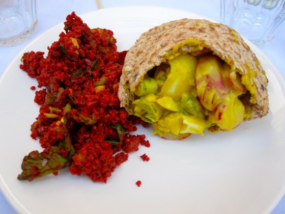 My plate - millet salad and a pita filled with curry egg salad with asparagus, apple, and radishes