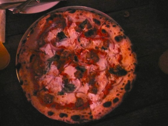 Paparizza - romesco, mozzarella, smoked paprika sausage, and onion