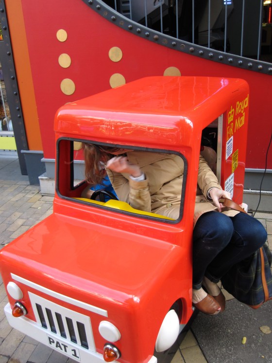 Trying to fit into the kiddie car