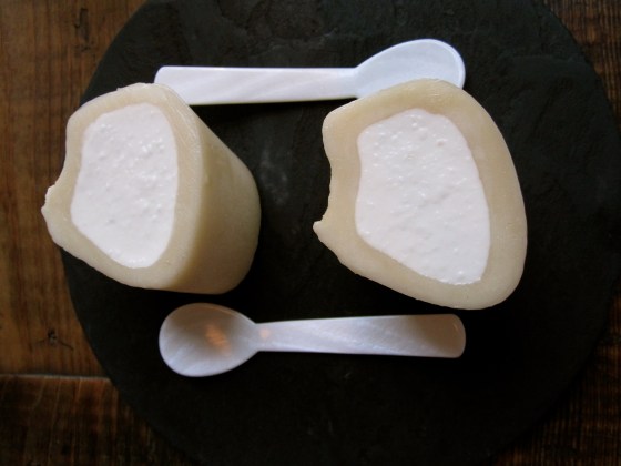 Tartare from eye of rump with oyster cream and cucumber served in bone marrow