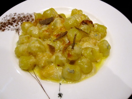 Cheesy gnocchi with fresh shaved truffle